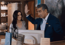 High Five Emily Hampshire GIF - High Five Emily Hampshire Eugene Levy GIFs