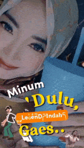 a woman wearing a hijab with the words minum dulu gaes on it
