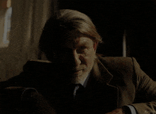 a man in a suit says " and i solve murders "