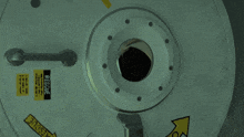 a cartoon character in a space suit is looking through a window