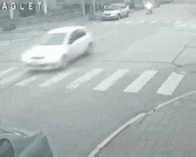 a man is running after a motorcycle that has crashed into him .