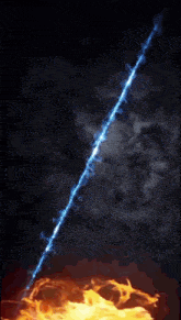 a blue beam of light is coming out of the ground