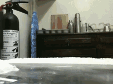 a carbon dioxide fire extinguisher is sitting on a counter