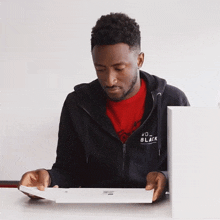 Looking At The Document Marques Brownlee GIF - Looking At The Document Marques Brownlee Scanning The Document GIFs