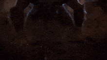a close up of a werewolf with its mouth open and teeth showing