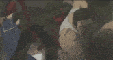 a man in a white tank top is laying on a bed with blood on his chest .