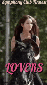 a woman is riding a black horse with the words symphony club finnest lovers