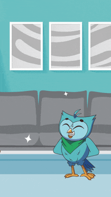 a cartoon bird wearing a green scarf is standing in front of a grey couch