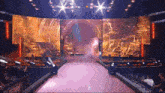 a stage with a large screen that says ew
