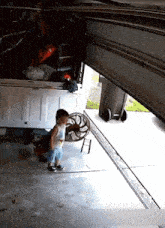 Baby Garage Door GIF