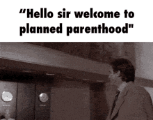 a man in a suit and tie is standing in front of an elevator with the words " hello sir welcome to planned parenthood " above him