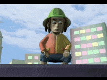 a cartoon character wearing a green hat is squatting down