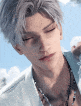 a close up of a man 's face with his eyes closed and a necklace around his neck