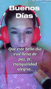a woman wearing red headphones with the words buenos dias on the top