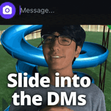a man with glasses is smiling in front of a blue slide with the words slide into the dms below him