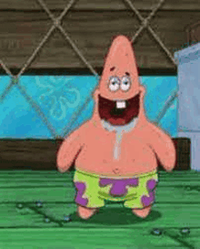 patrick star from spongebob squarepants is standing on a wooden floor and laughing .