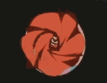 a close up of a cartoon character 's face with a red lightning bolt behind it .