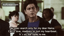 a man is standing in front of a crowd of people and saying `` my eyes search only for my dear naina . ''