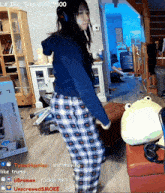 a woman in plaid pajamas is dancing in a living room with the words la irl trip $ 10 / $ 800 on the top