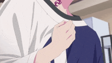 a person with a tattoo on their neck holds another person 's arm
