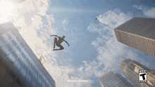 a spider man jumping in the air with a t on the bottom