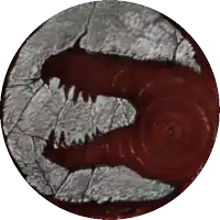 a circle with a red swirl on it