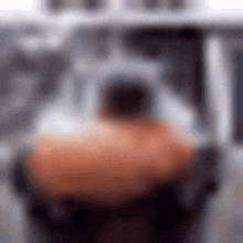 a blurry picture of a car parked in a parking lot .