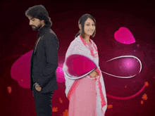 a man in a suit and a woman in a pink dress are standing back to back