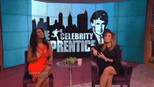 two women are sitting in front of a screen that says " celebrity prestige "
