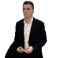 a man in a suit and white shirt is holding a piece of paper