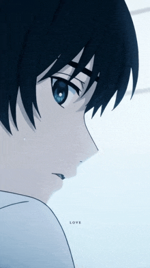 a close up of a person 's face with the word love on the bottom right