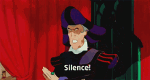 a cartoon character says silence in front of a red curtain