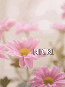 a mother 's day card with pink flowers and the name nicki on it