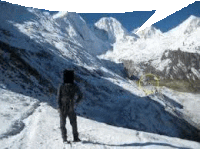 a person standing on top of a snowy mountain with a speech bubble above them