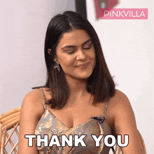 a woman sitting in a chair with the words thank you written on the bottom
