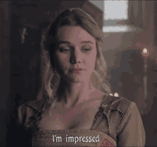 a woman says i 'm impressed while looking at something
