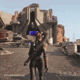 a woman holding a gun in front of a building that says dune awakening on the bottom