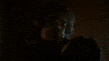a close up of a person holding another person 's hand