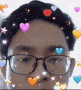 a man wearing glasses with hearts and stars around his face