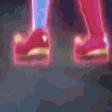 a close up of a person 's feet with a blue background