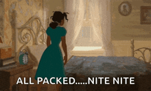 a woman in a blue dress is standing in a bedroom with the words all packed nite nite