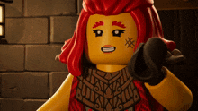 a lego figure with red hair and a tattoo on her face is smiling