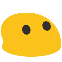 a yellow object with two black circles on it