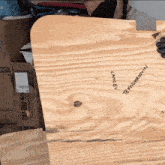 a piece of plywood with the name lankey written on it