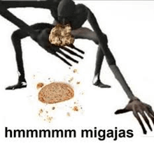 a black monster is eating a cookie with a fork and a hand .