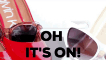 a pair of sunglasses with the words oh it 's on written above them