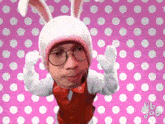 a man in a bunny costume with glasses and a bow tie