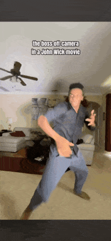 a man dancing in a living room with the caption " the boss off-camera in a john wick movie "
