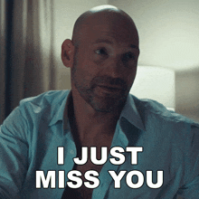 a bald man says i just miss you