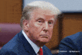 a close up of donald trump 's face with hailuo ai in the bottom right corner